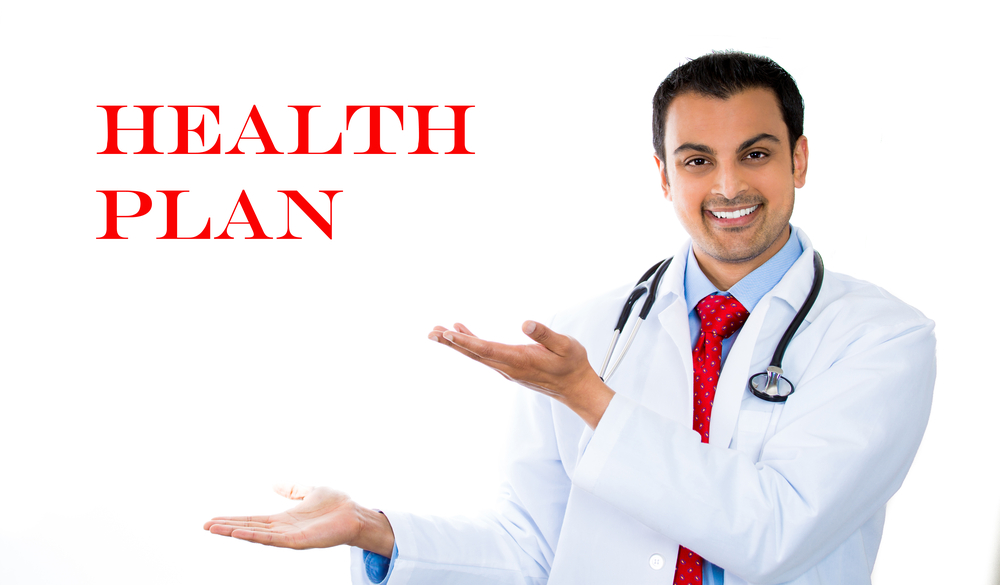 Closeup portrait of health care professional, dr or md with stethoscope pointing to sign that says healthcare reform now???, isolated on white background